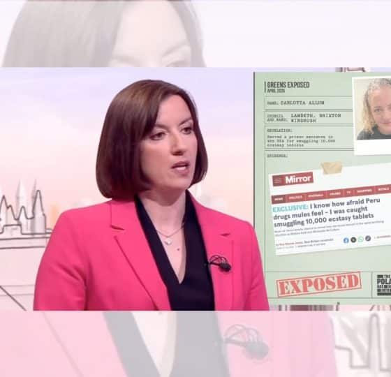 Bridget Phillipson in front of a Labour smear poster
