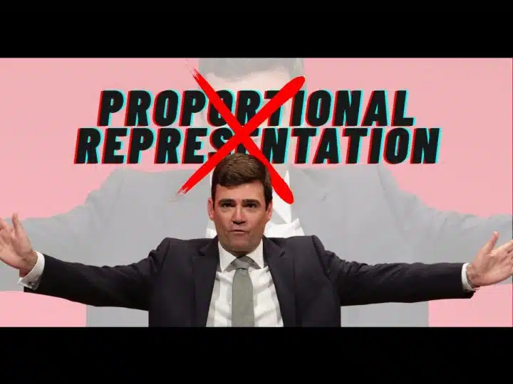 Andy Burnham with his arms out
