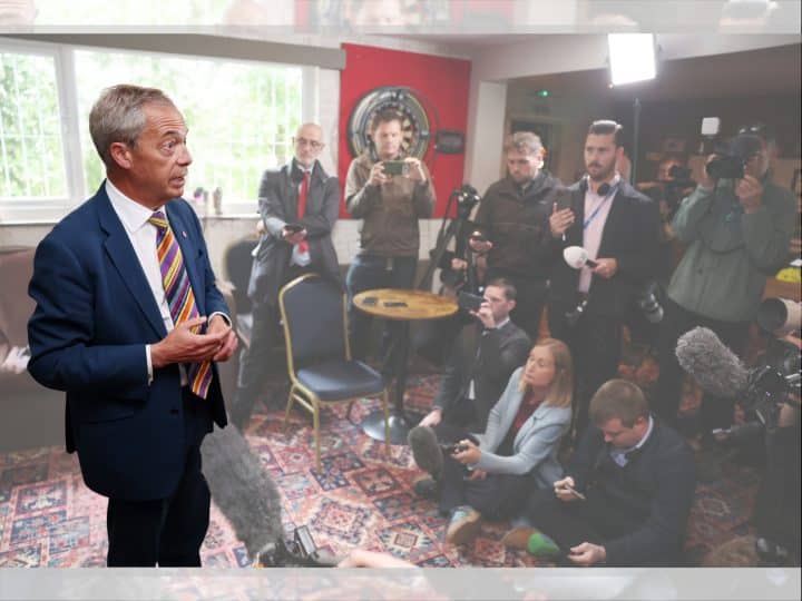Reform leader Nigel Farage in a room full of journalists