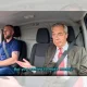 Nigel Farage and Robert Kenyon, both of Reform, sat in the front seats of a van