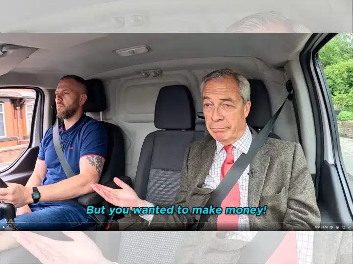 Nigel Farage and Robert Kenyon, both of Reform, sat in the front seats of a van