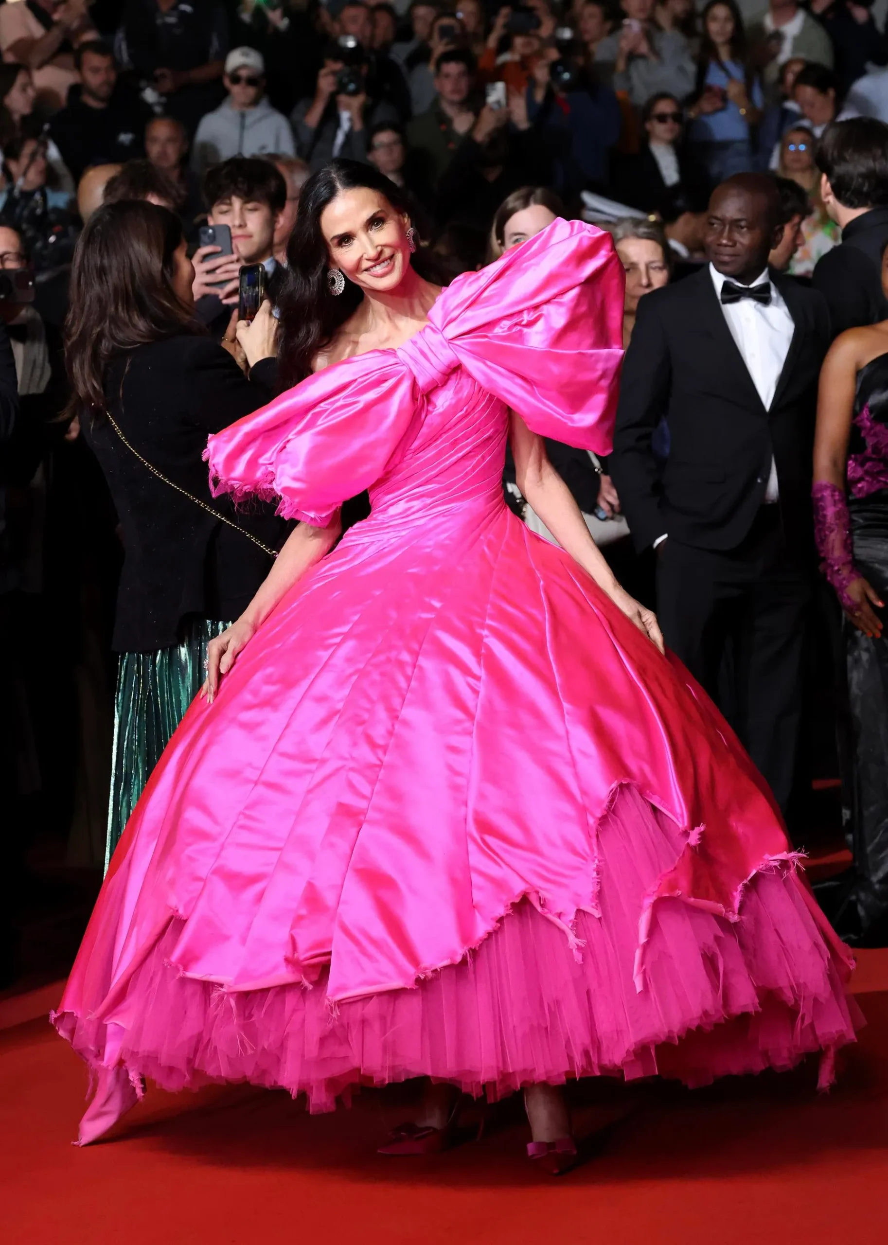 Demi Moore In Pink Silk Matieres Fecales At The Paper Tiger Premiere During The 79th Cannes Film Festival