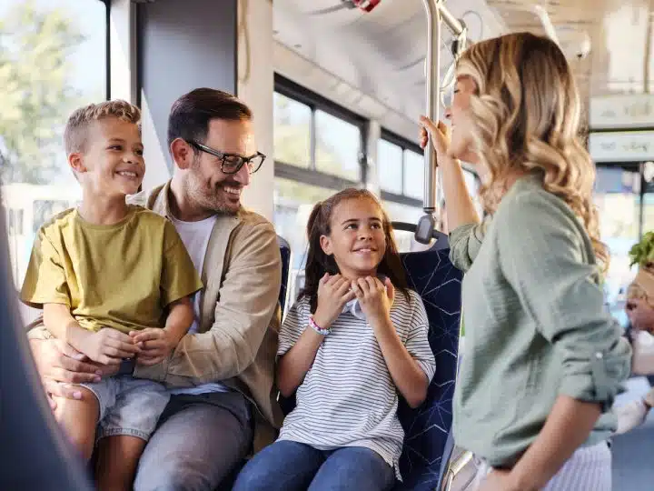 A family on a bus Summer Savings