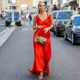 PARIS, FRANCE - JULY 06: Leonie Hanne is seen wearing red dress, golden bag, heels outside Jean Paul Gaultier during Paris Fashion Week - Haute Couture Fall Winter 2022 2023 : Day Three on July 06, 2022 in Paris, France. (Photo by Christian Vierig/Getty Images)