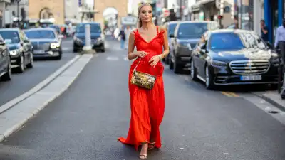 PARIS, FRANCE - JULY 06: Leonie Hanne is seen wearing red dress, golden bag, heels outside Jean Paul Gaultier during Paris Fashion Week - Haute Couture Fall Winter 2022 2023 : Day Three on July 06, 2022 in Paris, France. (Photo by Christian Vierig/Getty Images)