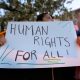 Protest placard reading Human Rights For All