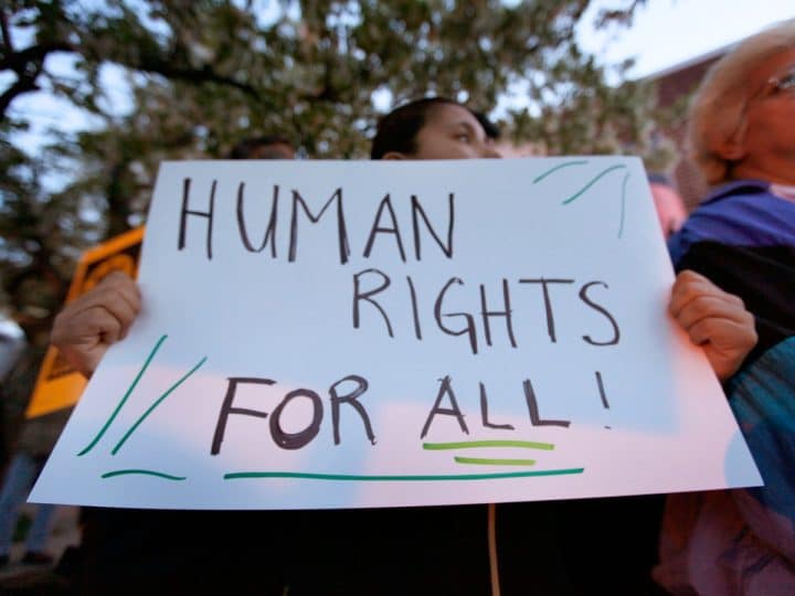 Protest placard reading Human Rights For All