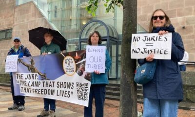 Jury Alliance supporters outside a crown court