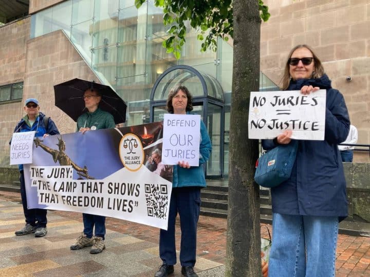 Jury Alliance supporters outside a crown court