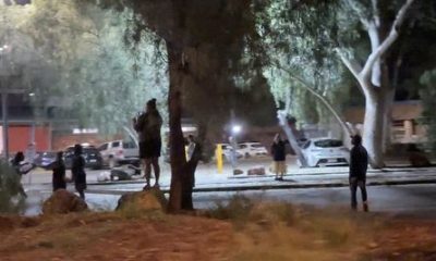 Protesters clash with Australian police after suspected killer of Indigenous girl arrested
