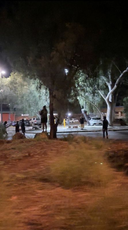 Protesters clash with Australian police after suspected killer of Indigenous girl arrested
