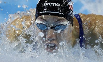 Swimming-American Walsh improves own 100m butterfly world record for third time in a year