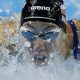 Swimming-American Walsh improves own 100m butterfly world record for third time in a year