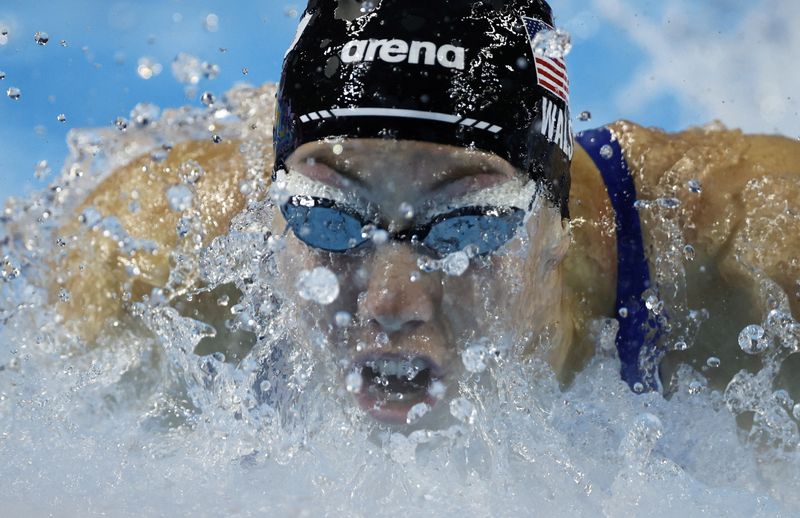 Swimming-American Walsh improves own 100m butterfly world record for third time in a year
