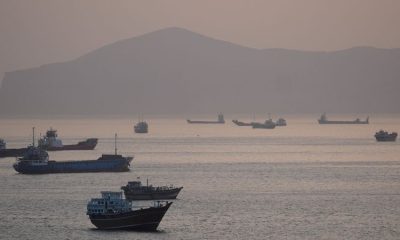 Iran warns US to keep out of Hormuz after Trump pledges help for stranded ships