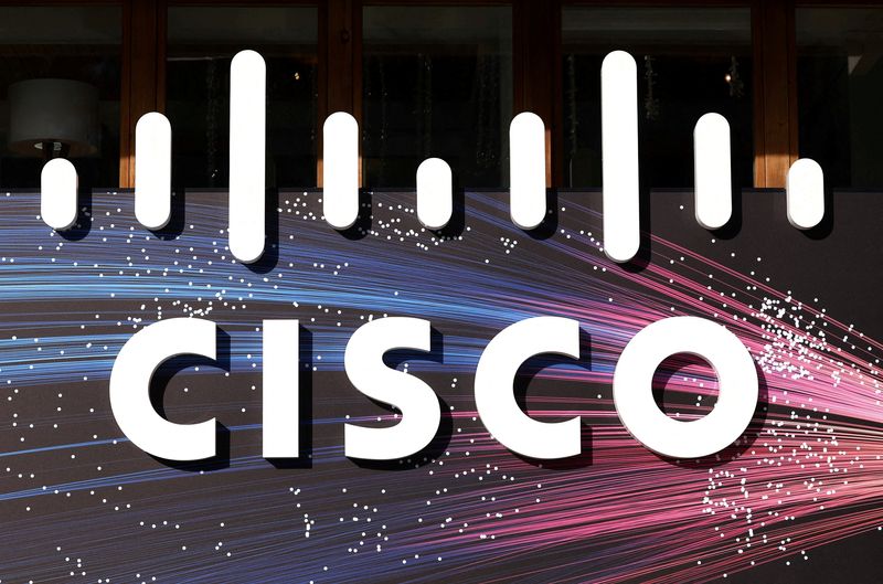 Cisco jumps on strong revenue forecast, AI push with job cuts