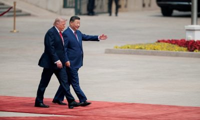 Analysis-Trump returns from China with stability and a stalemate
