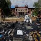 Forensic experts sift through ruined dormitory in Russian-held Luhansk region