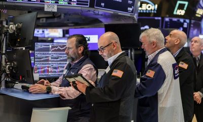 Wall Street hits new closing highs on tech strength, Middle East deal hopes