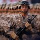 Japan refutes ’new militarism’, accuses China of rapidly arming