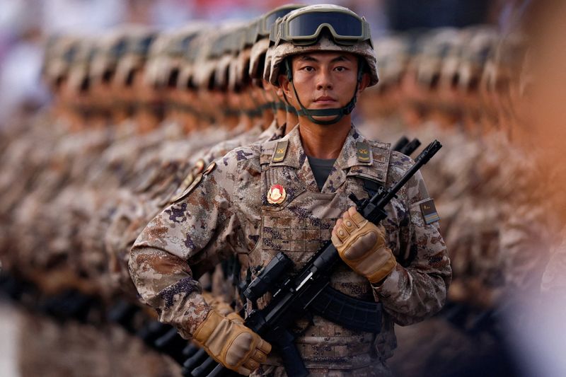 Japan refutes ’new militarism’, accuses China of rapidly arming
