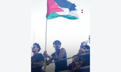 barcelona victory parade - lamine yamal holds up palestine flag