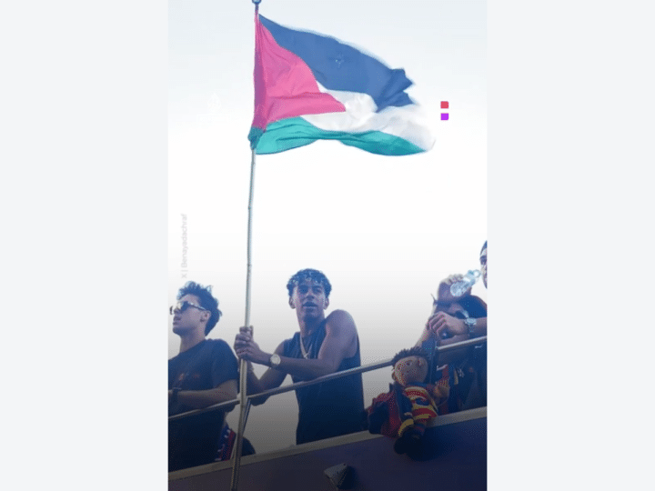 barcelona victory parade - lamine yamal holds up palestine flag