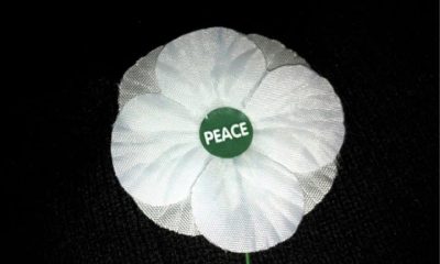 A Peace Pledge Union white poppy Petition against conscription International Conscientious Objectors' Day