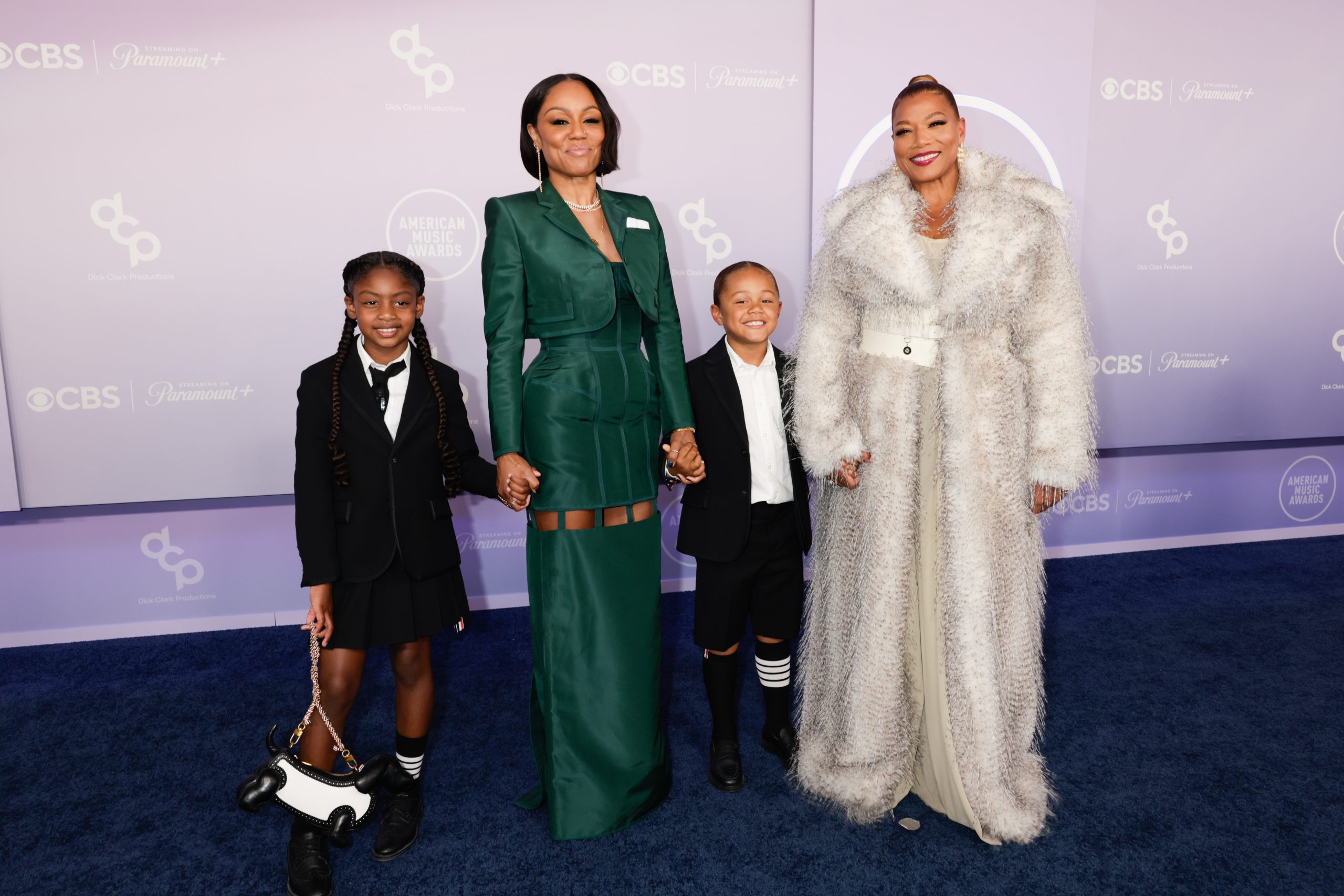 Queen Latifah Sparks Reactions AMAs Red Carpet Partner Eboni Nichols Son Rebel Videos