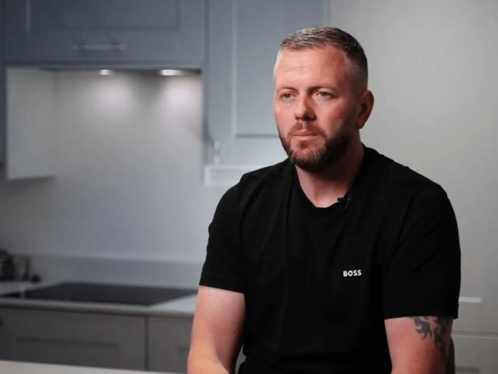 Robert Kenyon, Reform's candidate in the Makerfield by-election, sat at a kitchen counter