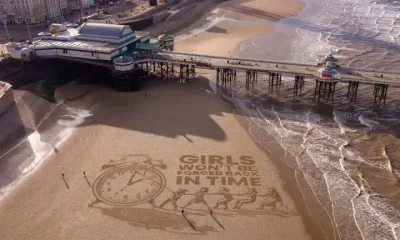 Sand art by Plan International UK Girls Won't Be Forced Back In Time