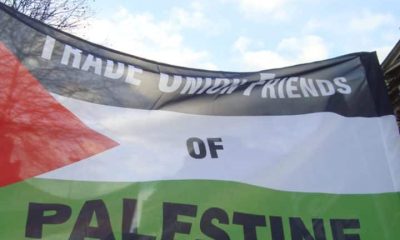A Palestine flag with the words Trade Union Friends Of Palestine Trade unions to mark Nakba Day