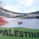 A Palestine flag with the words Trade Union Friends Of Palestine Trade unions to mark Nakba Day
