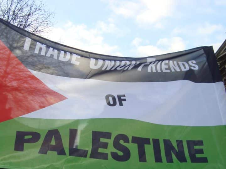 A Palestine flag with the words Trade Union Friends Of Palestine Trade unions to mark Nakba Day