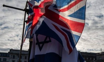 A Union flag and an Israel flag Complaint about UK Lawyers For Israel