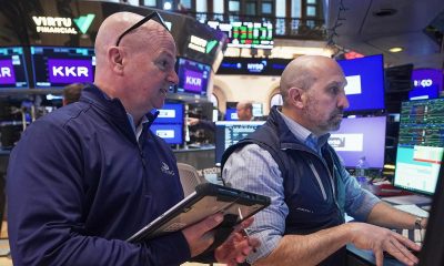 Wall Street advances as AI chip stocks surge