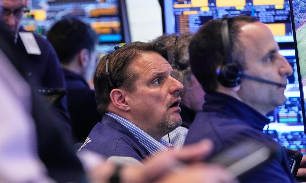 Wall Street ends mixed as borrowing costs in focus