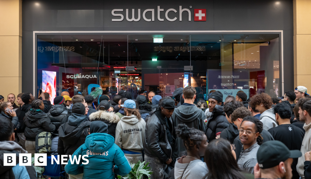 Swatch shuts stores after crowds queue for new watch