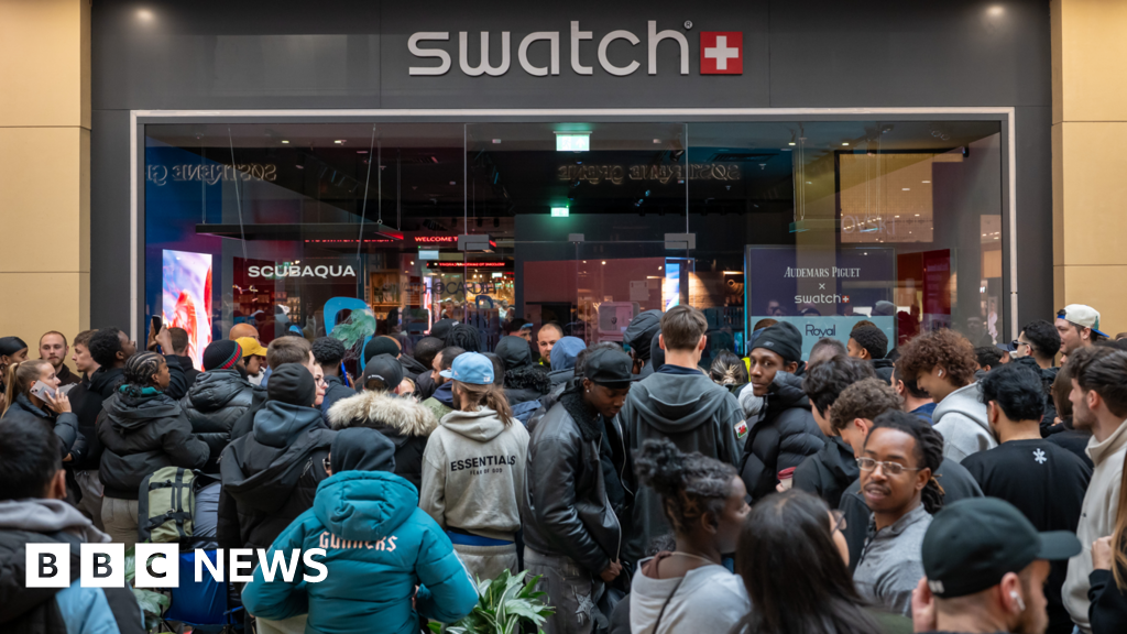 Swatch shuts stores after crowds queue for new watch