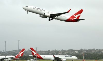 Australia's competition regulator said it would block a pricing, code-sharing and scheduling deal between Qantas and Japan Airlines because it would likely mean higher fares for passengers