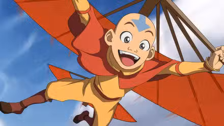 Aang air-gliding with a large smile in Avatar: The Last Airbender.