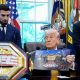Ilia Topuria and Justin Gaethje alongside US President Donald Trump inside the Oval Office at the White House