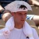 Jakub Mensik sits with an ice pack on his head during his first-round match at the French Open