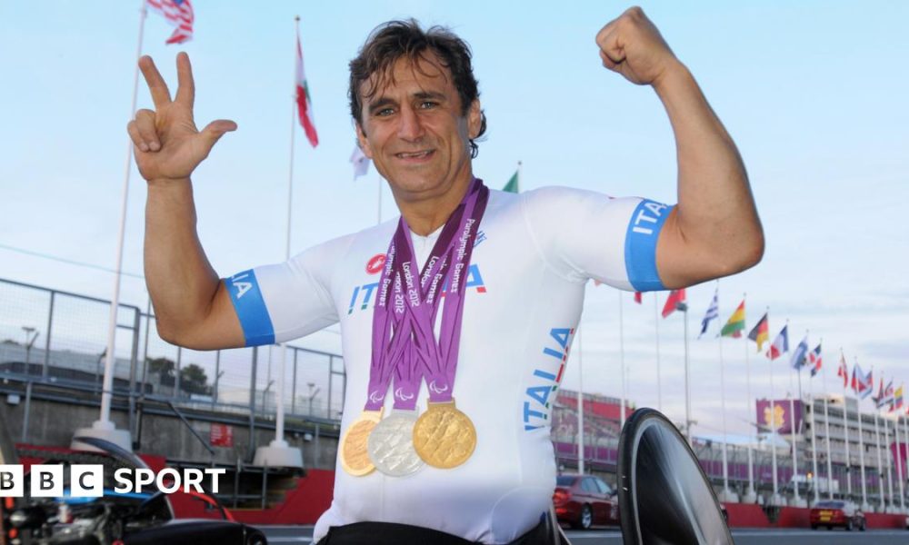 Alex Zanardi celebrates after winning a silver medal in the Team Relay event at the 2012 Paralympic Games. He also won two golds