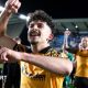 Hull City winger Mohamed Belloumi celebrates in front of his team-mates after their 2-0 win at Millwall