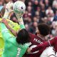 Pablo of West Ham United fouls David Raya of Arsenal before Callum Wilson scores a goal that is later disallowed following a VAR review