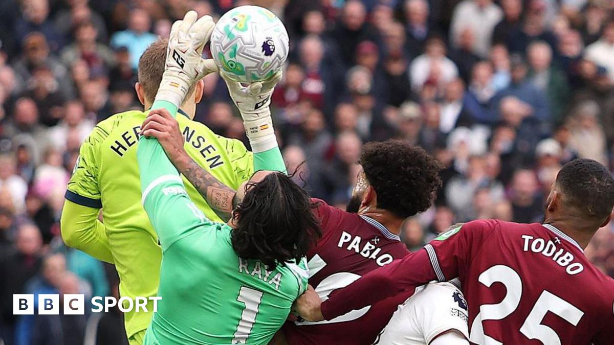 Pablo of West Ham United fouls David Raya of Arsenal before Callum Wilson scores a goal that is later disallowed following a VAR review