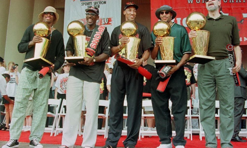 Dennis Rodman, Michael Jordan, Scottie Pippen, Ron Harper and head coach Phil Jackson all of the Chicago Bulls