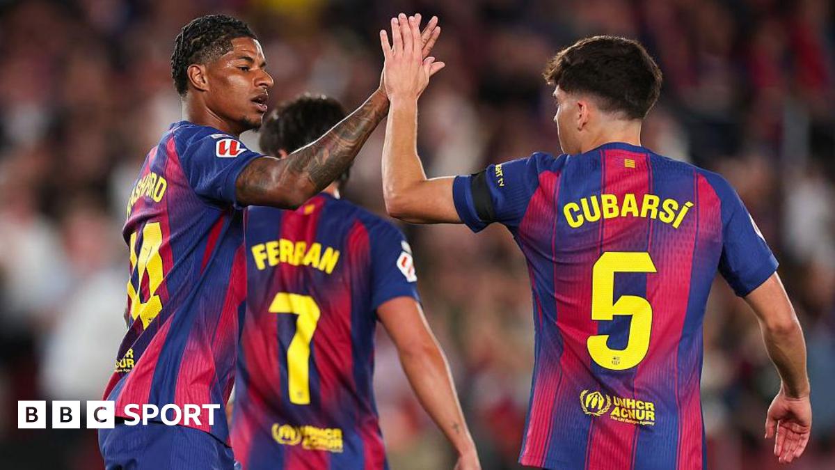 Marcus Rashford celebrates a goal for Barcelona