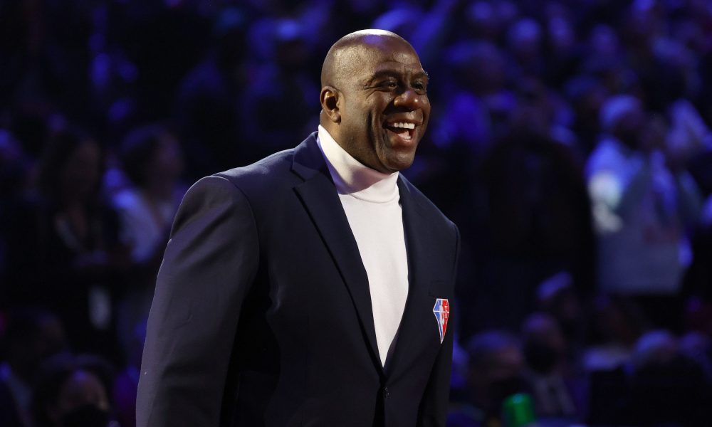Earvin "Magic" Johnson reacts after being introduced as part of the NBA 75th Anniversary Team during the 2022 NBA All-Star Game at Rocket Mortgage Fieldhouse on February 20, 2022 in Cleveland, Ohio.
